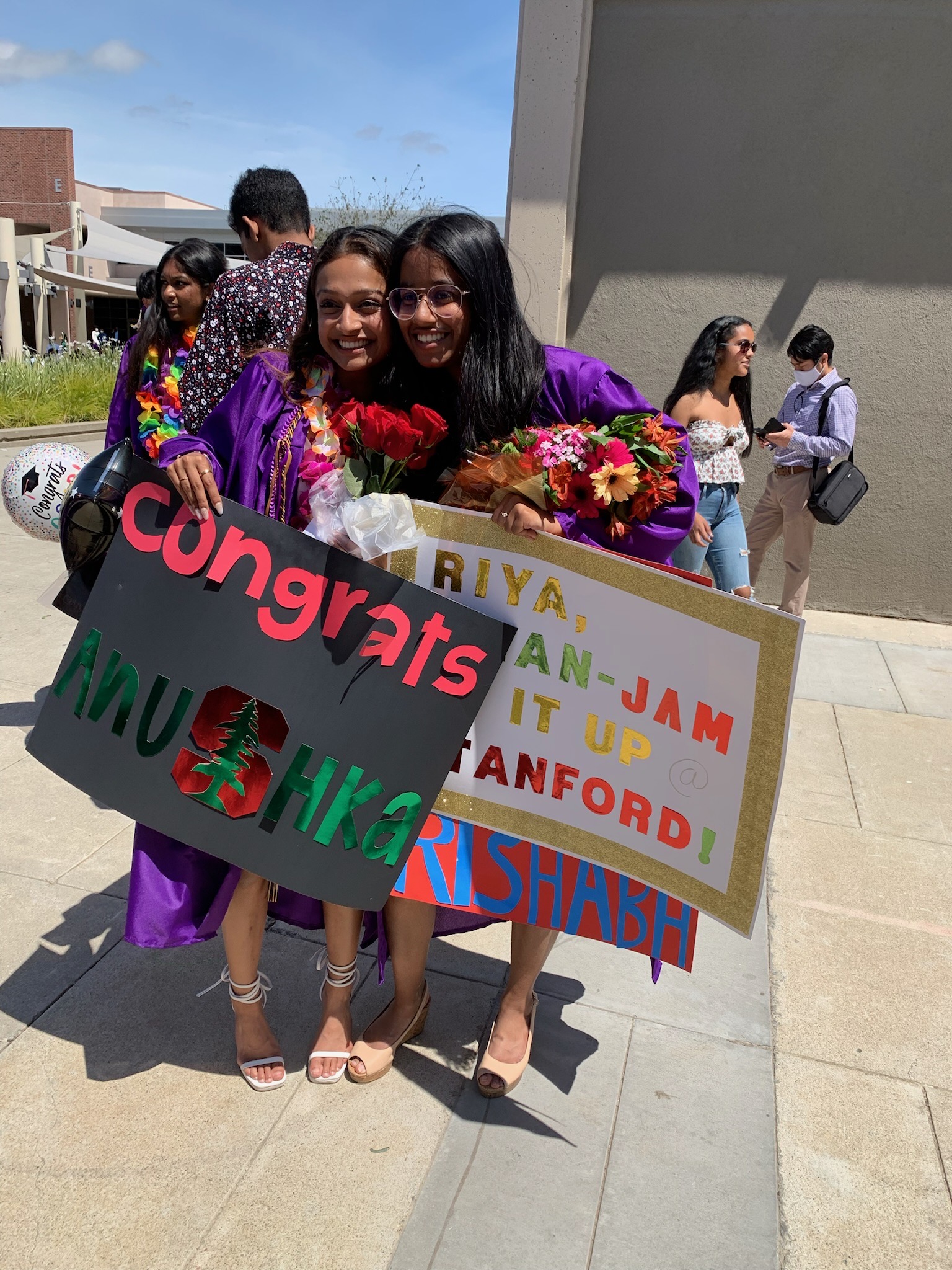 Riya and me at our high school graduation
